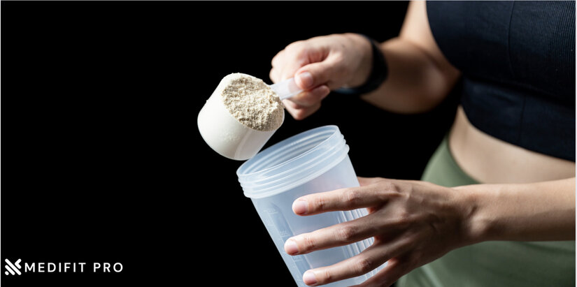 A protein scoop being poured into bottle Medifitpro.com